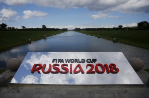 The 2018 World Cup logo is pictured near the Konstantin (Konstantinovsky) Palace, the venue of the preliminary draw for the 2018 World Cup, in St. Petersburg, July 24, 2015. The 2018 World Cup's preliminary draw will be held in St. Petersburg on July 25. REUTERS/Maxim Shemetov