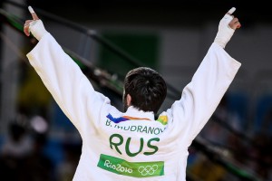 RIO DE JANEIRO, BRAZIL - AUGUST 6, 2016: Russia's Beslan Mudranov reacts after defeating Georgia's Amiran Papinashvili in their men's -60 kg semifinal judo match at the 2016 Summer Olympic Games in Rio de Janeiro, Brazil, at Carioca Arena 2. Valery Sharifulin/TASS Áðàçèëèÿ. Ðèî-äå-Æàíåéðî. 6 àâãóñòà 2016. Ðîññèéñêèé ñïîðòñìåí Áåñëàí Ìóäðàíîâ, ïîáåäèâøèé ãðóçèíñêîãî ñïîðòñìåíà À.Ïàïèíàøâèëè, âî âðåìÿ ïîëóôèíàëüíûõ ñîðåâíîâàíèé ïî äçþäî ñðåäè ìóæ÷èí â âåñîâîé êàòåãîðèè äî 60 êã íà XXXI ëåòíèõ Îëèìïèéñêèõ èãðàõ. Âàëåðèé Øàðèôóëèí/ÒÀÑÑ