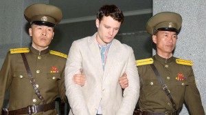 FILE PHOTO - Otto Frederick Warmbier (C), a University of Virginia student who was detained in North Korea since early January, is taken to North Korea's top court in Pyongyang, North Korea, in this photo released by Kyodo March 16, 2016.        Mandatory credit REUTERS/Kyodo/File Photo   ATTENTION EDITORS - THIS IMAGE HAS BEEN SUPPLIED BY A THIRD PARTY. FOR EDITORIAL USE ONLY. NOT FOR SALE FOR MARKETING OR ADVERTISING CAMPAIGNS. MANDATORY CREDIT.  JAPAN OUT. NO COMMERCIAL OR EDITORIAL SALES IN JAPAN