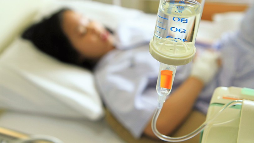 Woman patient on hospital bed